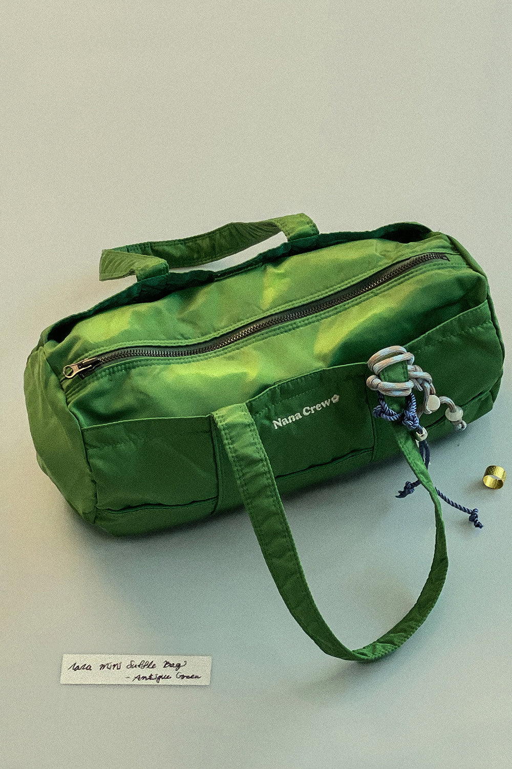 nana-crew-ss-24-nana-mini-duffle-bag-antique-green