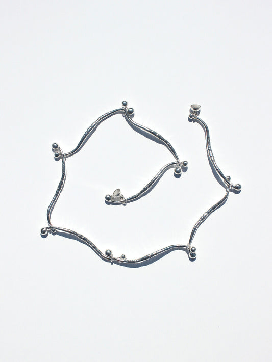 inodore-seasonless-shell-weaved-necklace